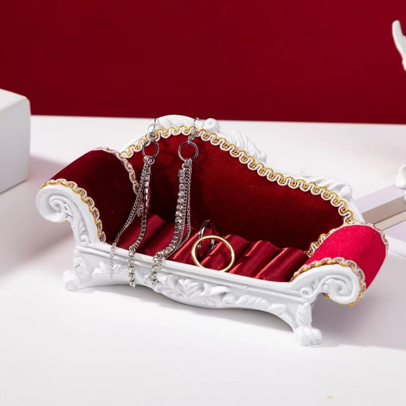 Luxurious black princess necklace display sofa