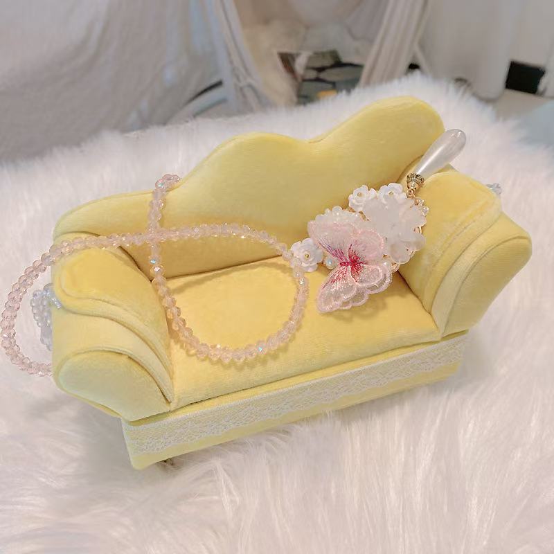 Luxurious black princess necklace display sofa