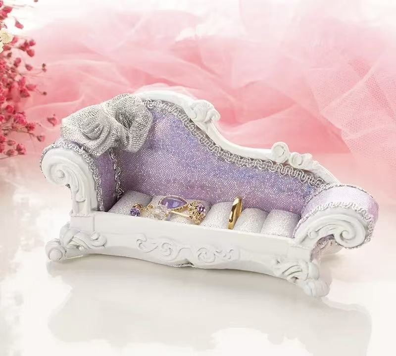 Luxurious black princess necklace display sofa